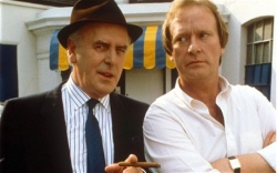 Cole and co-star Dennis Waterman in British TV’s long-running Minder 